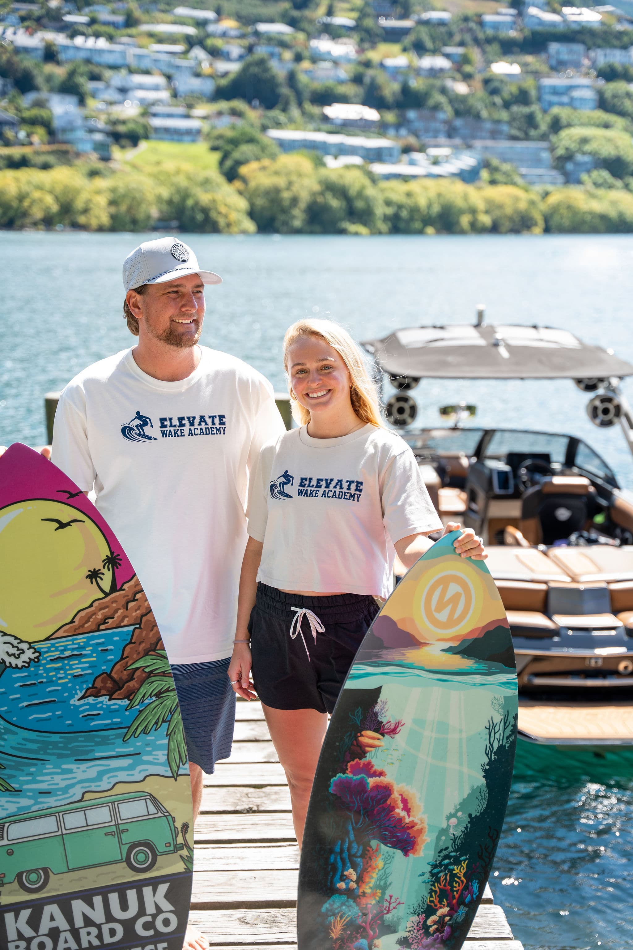 Emma Galusha holding her Kanuk Board Co signature wakesurf board